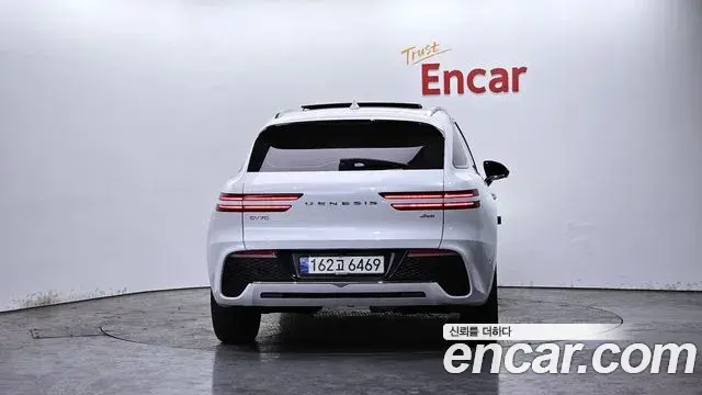 Genesis GV70 2021 — ფოტო 15/21