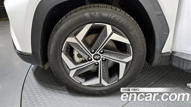 Hyundai Tucson Hybrid 2023 — ფოტო 7/20