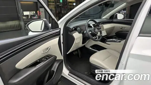 Hyundai Tucson Hybrid 2023 — ფოტო 9/20