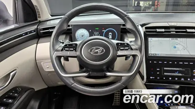 Hyundai Tucson Hybrid 2023 — ფოტო 19/20