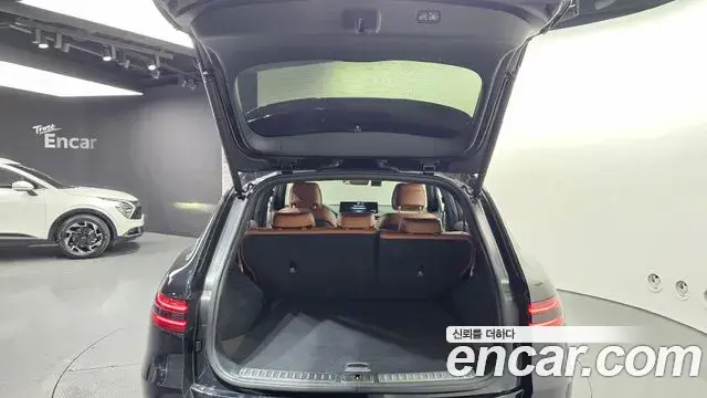 Genesis GV70 2021 — ფოტო 7/30