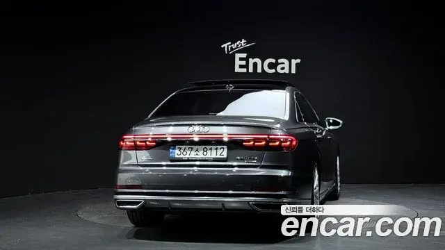 Audi A8 2021 — Фото 4/20
