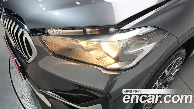 BMW X1 2022 — ფოტო 19/33