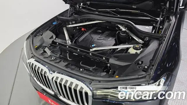 BMW X7 2021 — ფოტო 17/20