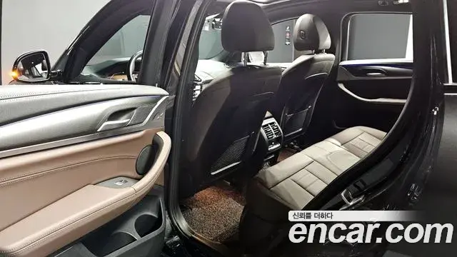 BMW X4 2021 — ფოტო 22/32