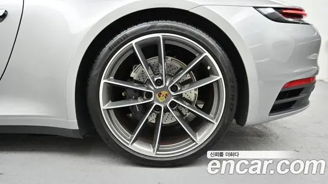 Porsche 911 2024 — ფოტო 1/20