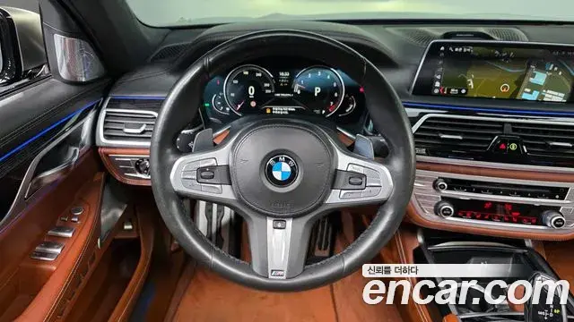 BMW 7 Series 2018 — Фото 12/20