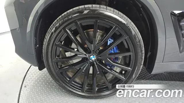 BMW X5 2025 — ფოტო 27/31