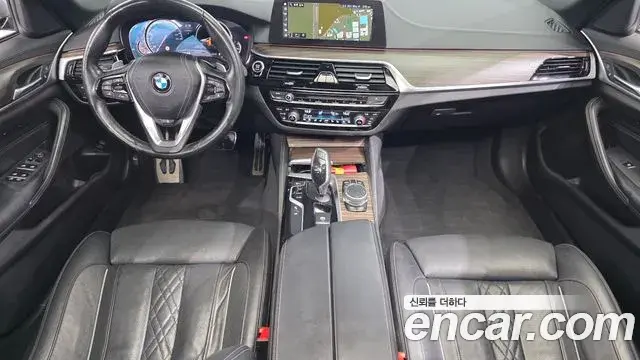 BMW 5 Series 2018 — Фото 7/20