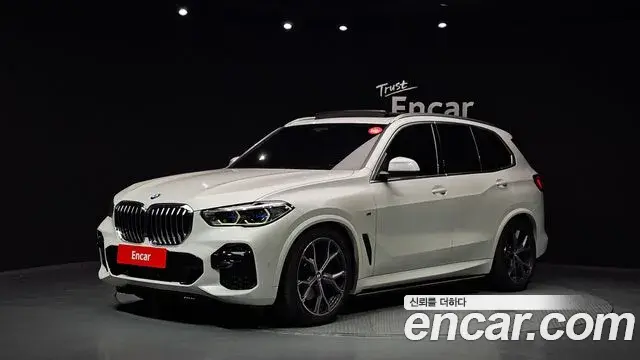 BMW X5 2023 — ფოტო 29/32