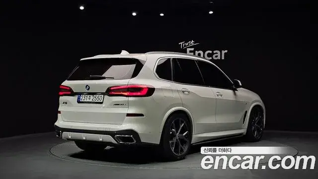 BMW X5 2023 — ფოტო 15/32
