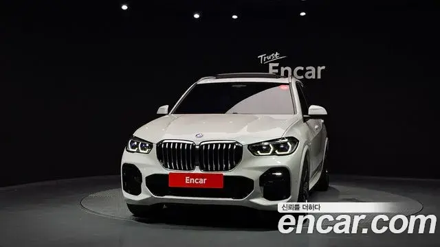 BMW X5 2023 — ფოტო 8/32