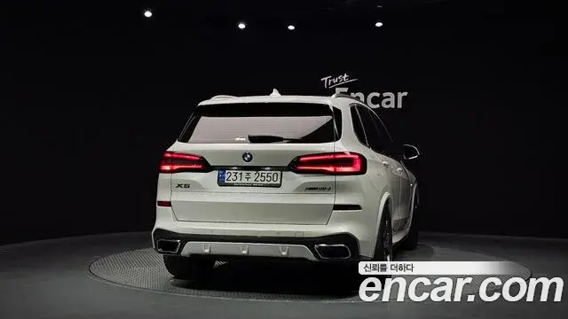 BMW X5 2023 — ფოტო 13/32