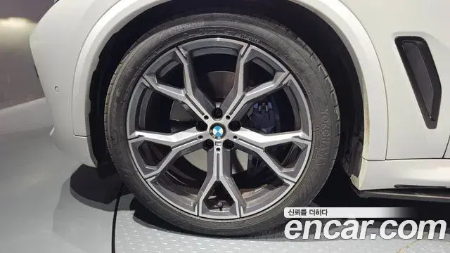BMW X5 2023 — ფოტო 21/32