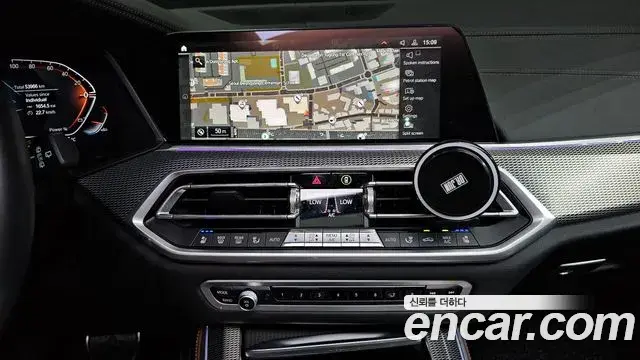 BMW X5 2023 — ფოტო 28/32