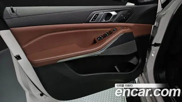 BMW X5 2023 — ფოტო 22/32