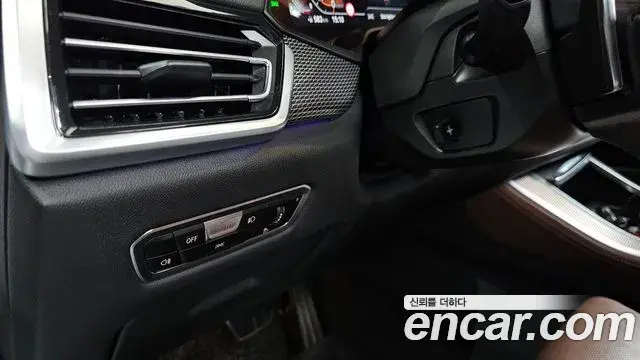 BMW X5 2023 — ფოტო 30/32