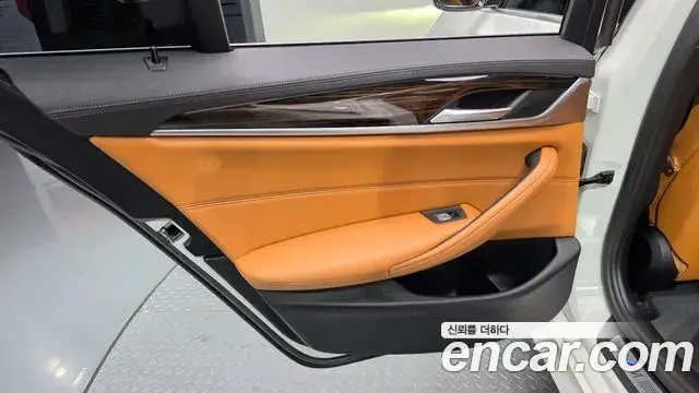 BMW 5 Series 2021 — ფოტო 26/30