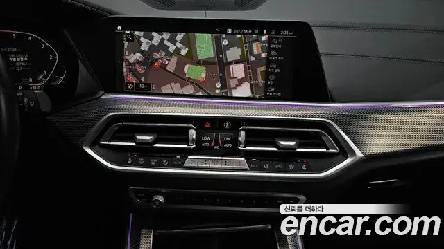BMW X5 2019 — ფოტო 28/33