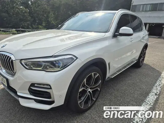 BMW X5 2021 — ფოტო 17/20