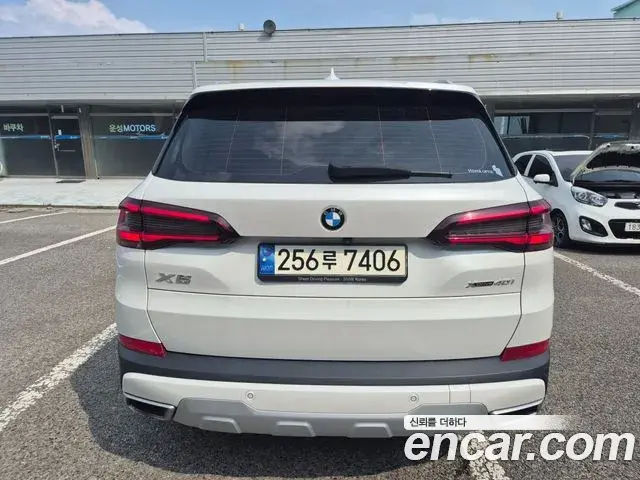 BMW X5 2021 — ფოტო 9/20