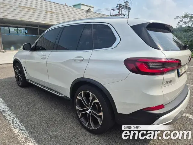 BMW X5 2021 — ფოტო 5/20