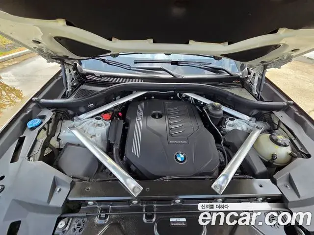 BMW X5 2021 — ფოტო 16/20