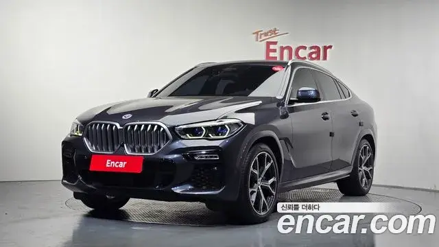 BMW X6 2021 — Фото 1/20