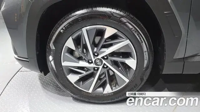 Hyundai Tucson Hybrid 2021 — Photo 14/31