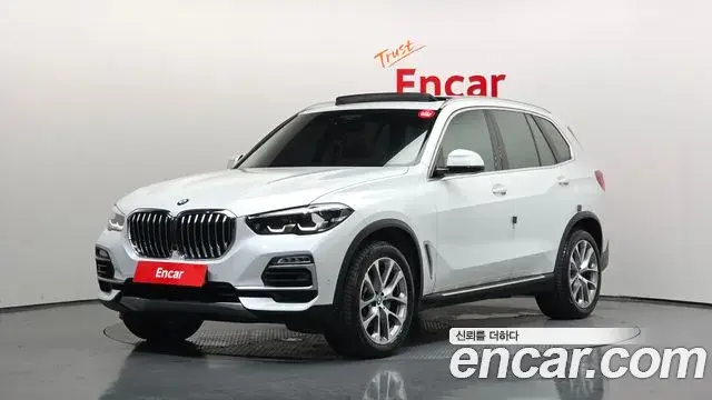 BMW X5 2019 — Фото 1/20