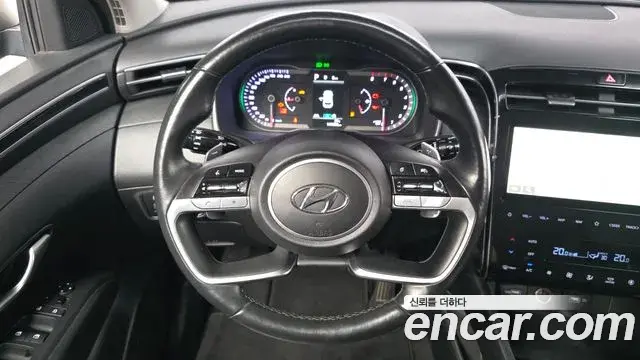 Hyundai Tucson Hybrid 2020 — ფოტო 10/31