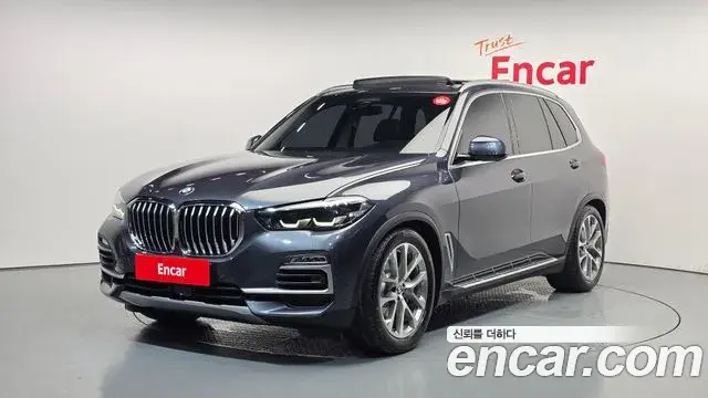 BMW X5 2020 — Фото 1/20