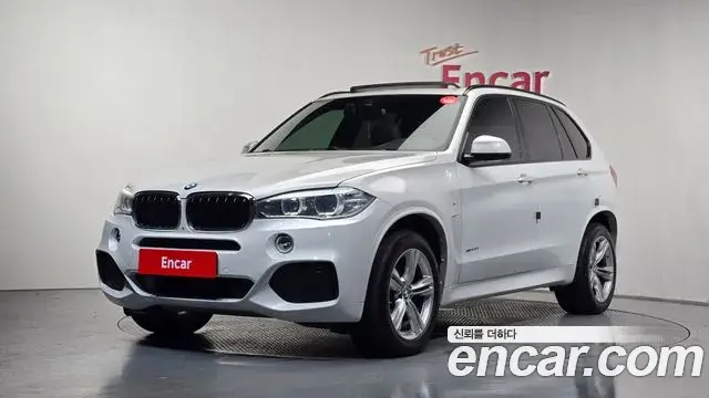 BMW X5 2018 — Фото 1/20