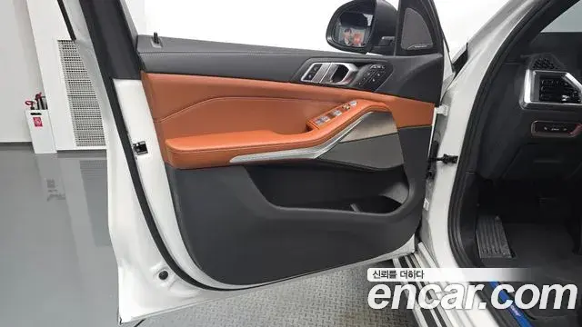 BMW X7 2025 — ფოტო 26/36