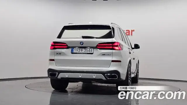 BMW X5 2025 — ფოტო 28/37