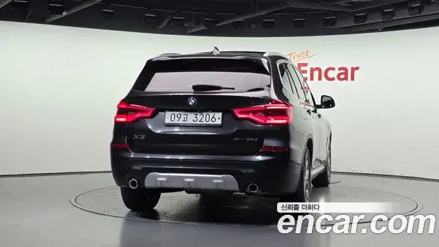 BMW X3 2019 — ფოტო 1/20