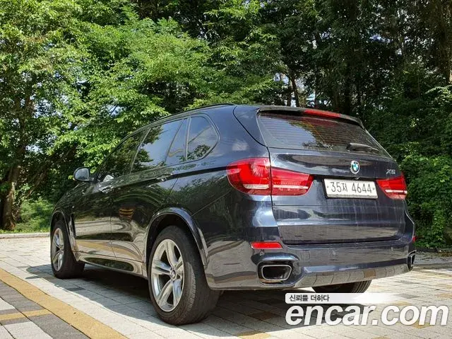 BMW X5 2018 — Фото 1/13