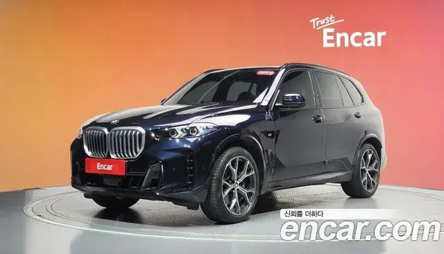 BMW X5 2023 — Фото 1/20
