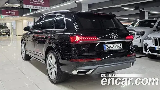 Audi Q7 2023 — Фото 7/19