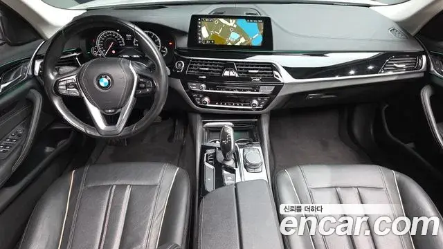 BMW 5 Series 2018 — Фото 7/20
