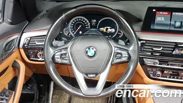 BMW 5 Series 2018 — Фото 11/20