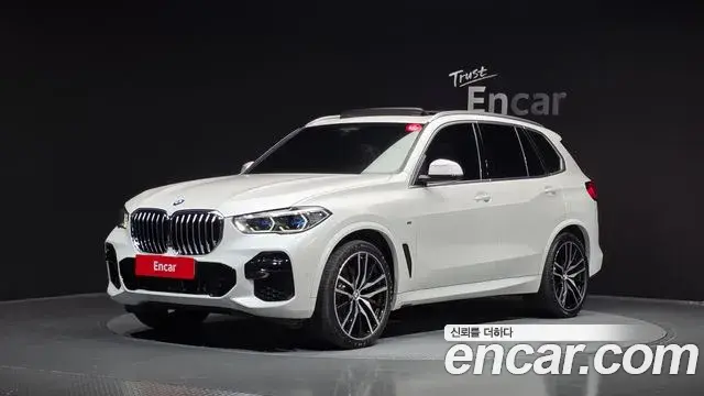 BMW X5 2021 — Фото 1/20
