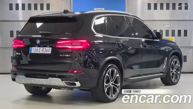 BMW X5 2021 — Фото 1/20