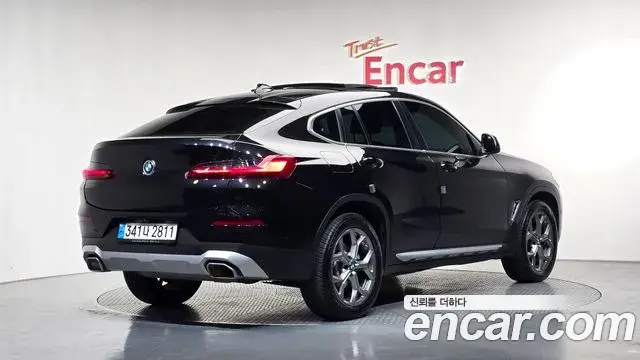 BMW X4 2023 — Фото 2/20