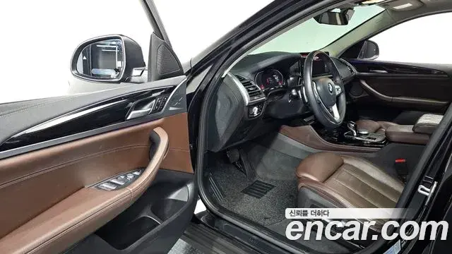 BMW X4 2023 — Фото 10/20