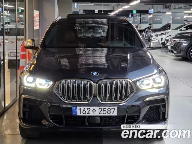 BMW X6 2022 — Фото 1/20
