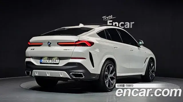 BMW X6 2021 — Фото 1/20