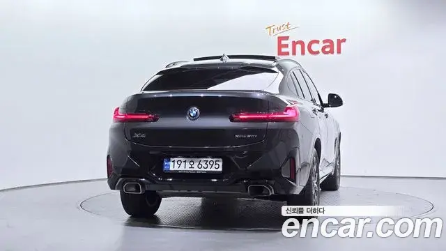 BMW X4 2023 — Фото 4/20