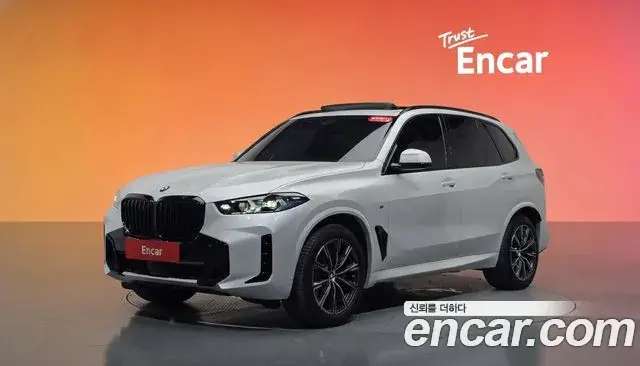 BMW X5 2024 — Фото 1/20