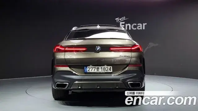 BMW X6 2021 — ფოტო 14/20